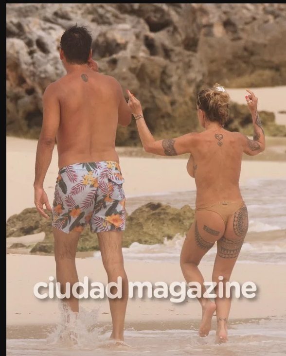 Flor Peña pelando tetas en la playa